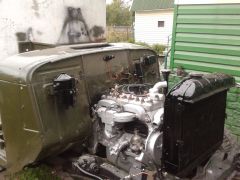 248 Радиатор родня, хотя и потрёпан жизнью на другом газоне