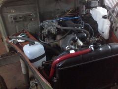 Сделали площадку для аккамулятора и за одно кронштейна для расширительного бочка.